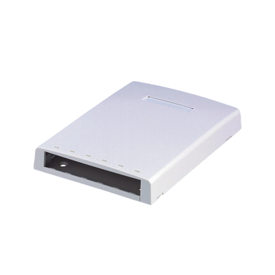 Caja de Montaje en Superficie, con Accesorio para Resguardo de Fibra Óptica, para 6 Módulos Mini-Com, Color Blanco
